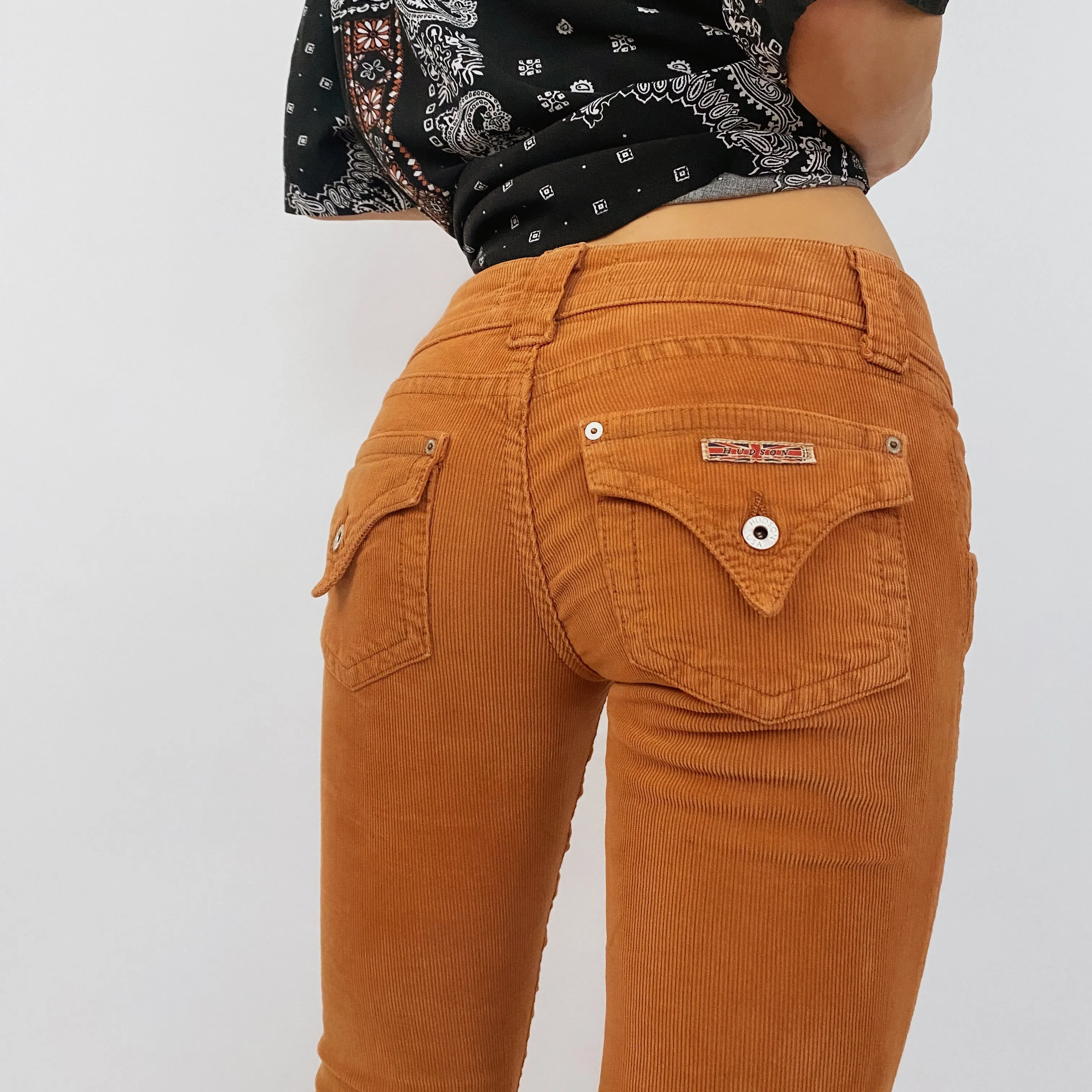 orange low rise corduroys - size 26